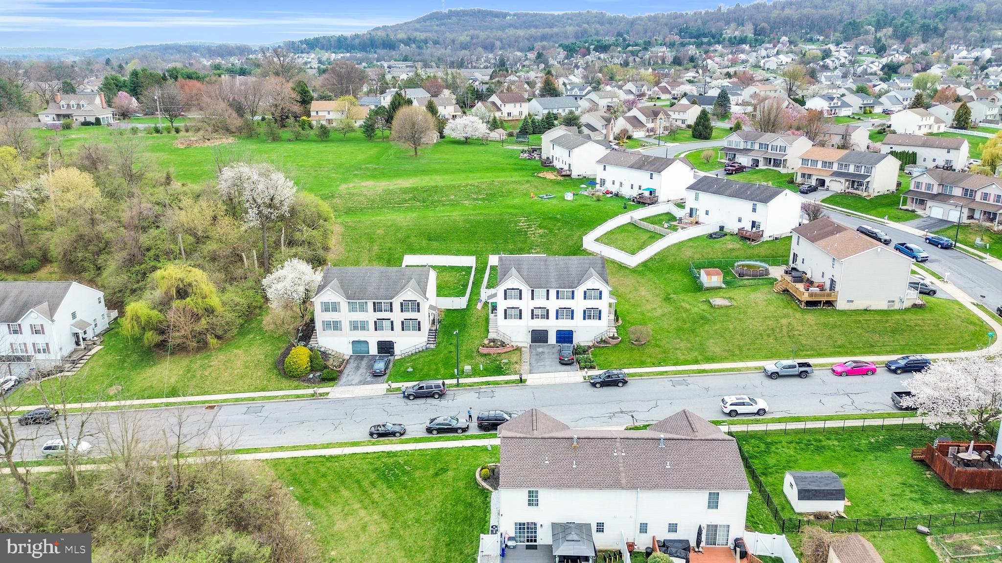1548 Huron Drive Sinking Spring, PA 19608 - Photo 32 of 32 an aerial view of residential houses with outdoor space and parking