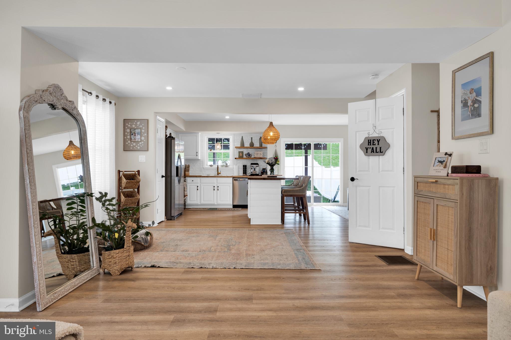 1548 Huron Drive Sinking Spring, PA 19608 - Photo 6 of 32 a view of a living room kitchen and a wooden floor