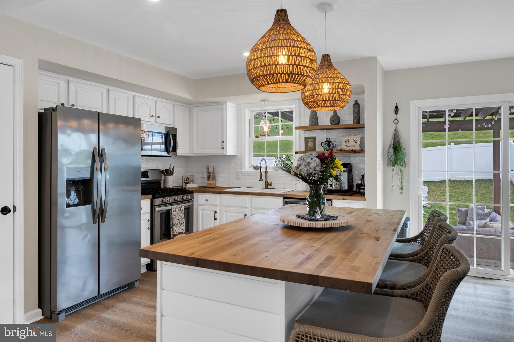 1548 Huron Drive Sinking Spring, PA 19608 - Photo 8 of 32 a kitchen with counter top space cabinets and stainless steel appliances