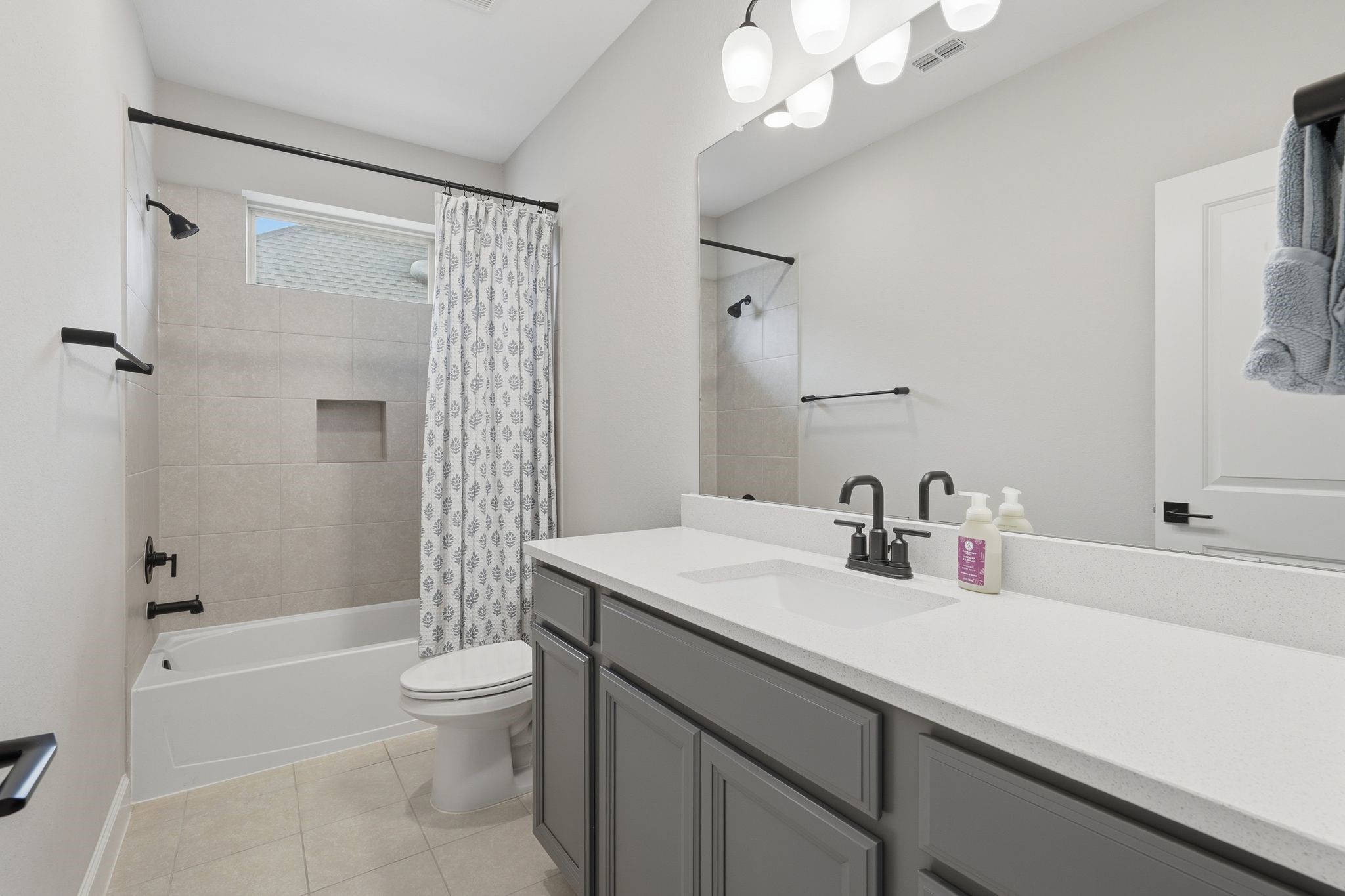 24423 Morningside Terrace Tomball, TX 77375 - Photo 22 of 47 a bathroom with a sink a toilet and shower