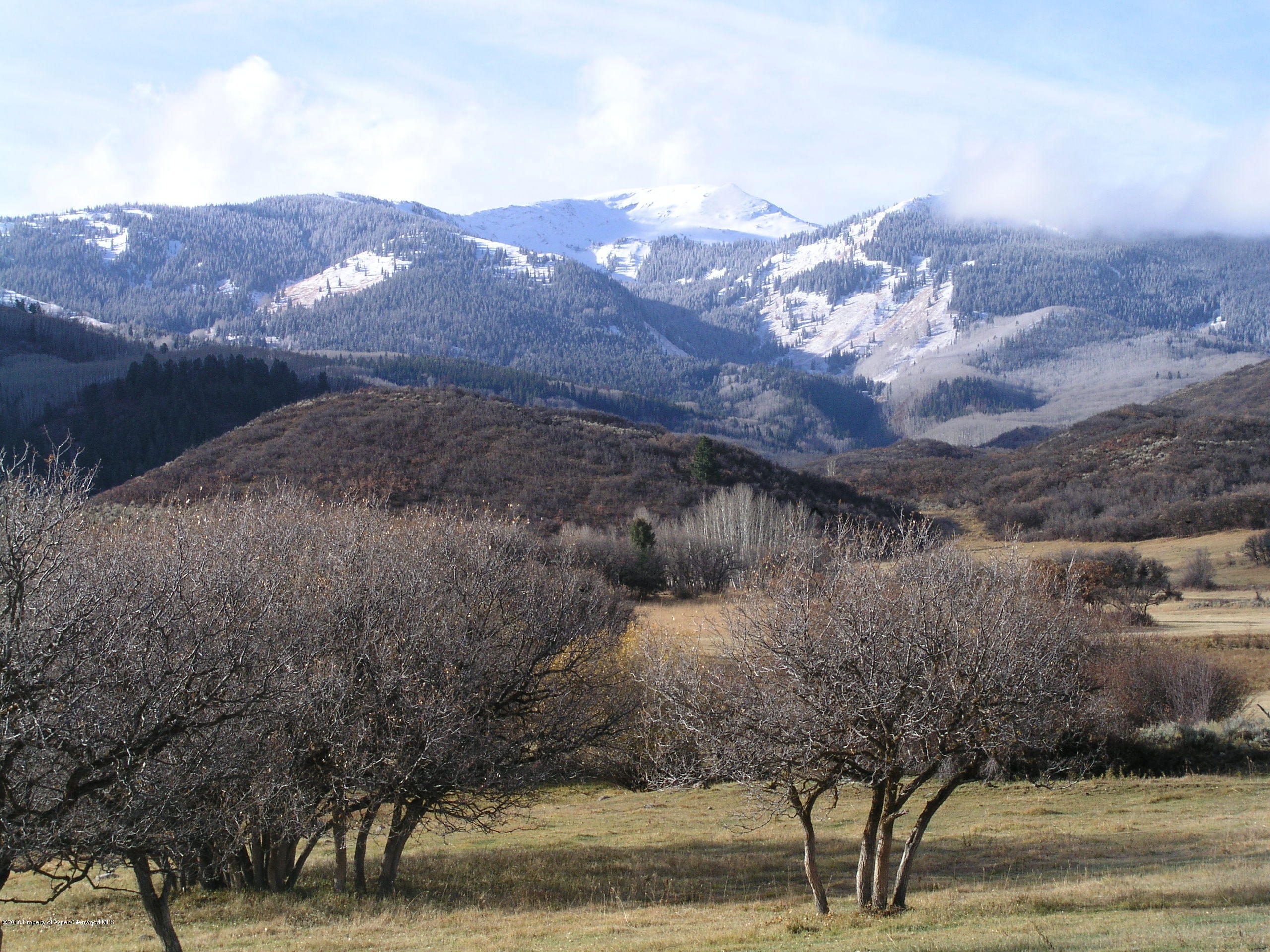 4516 Capitol Creek Road Snowmass, CO 81654 - Photo 37 of 59 a view of a house with a mountain