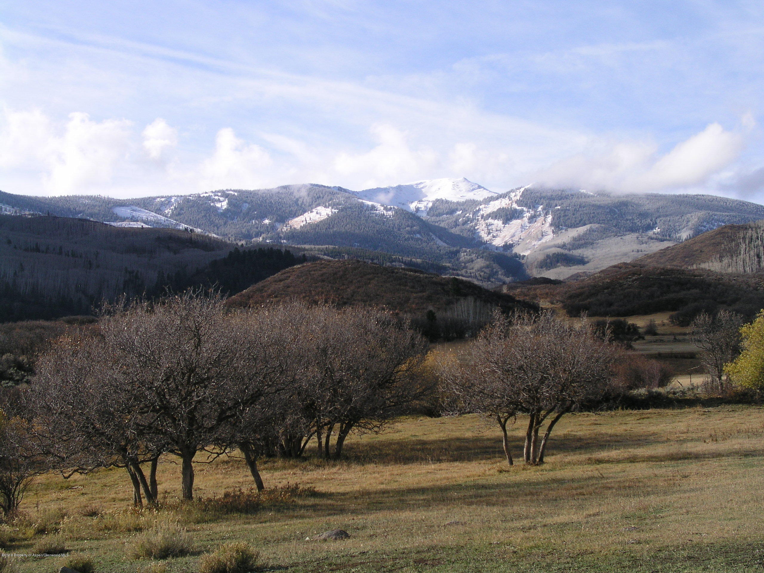 4516 Capitol Creek Road Snowmass, CO 81654 - Photo 38 of 59 a view of a town with mountains in the background