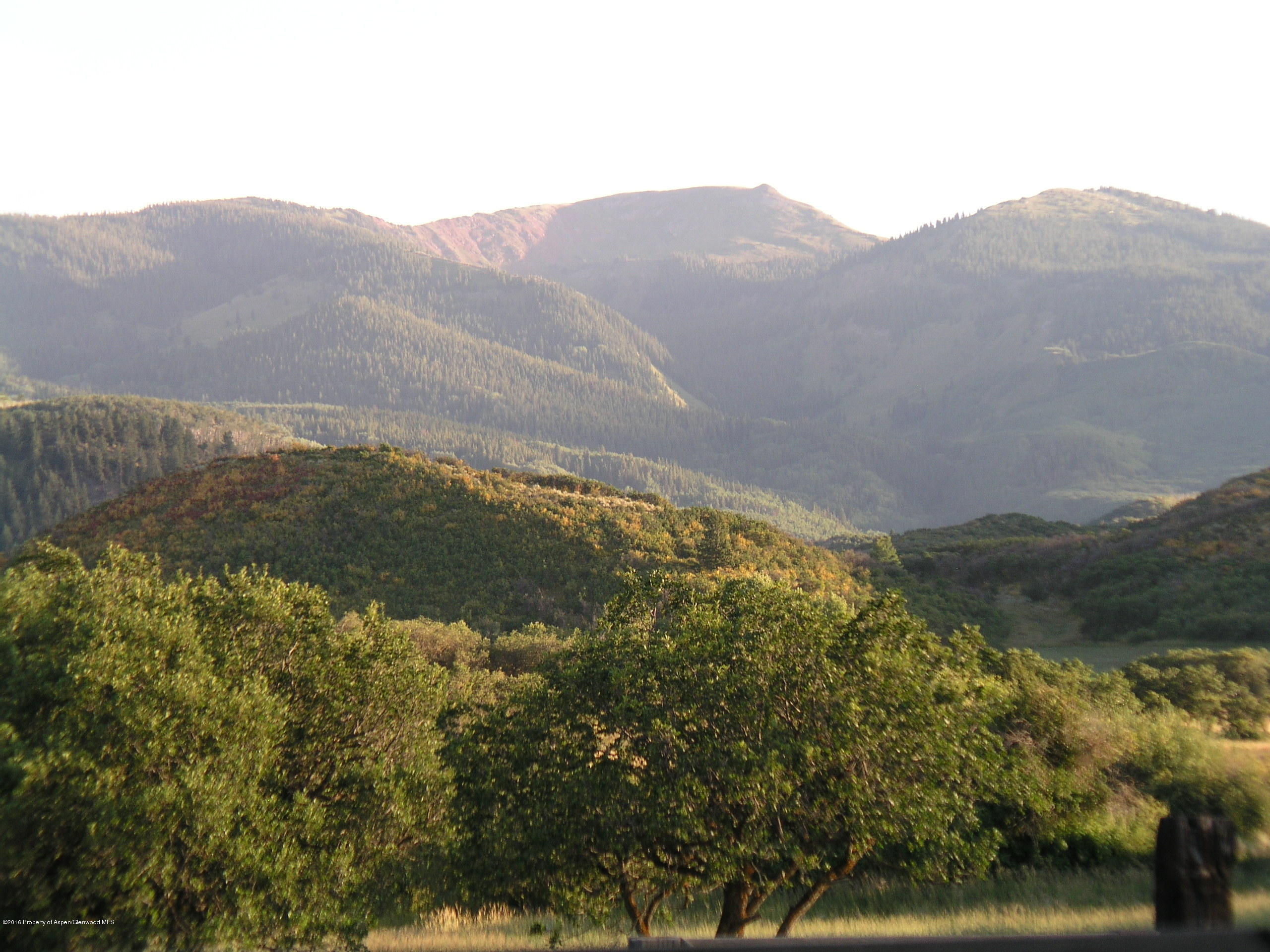 4516 Capitol Creek Road Snowmass, CO 81654 - Photo 46 of 59 a view of a lake with a mountain