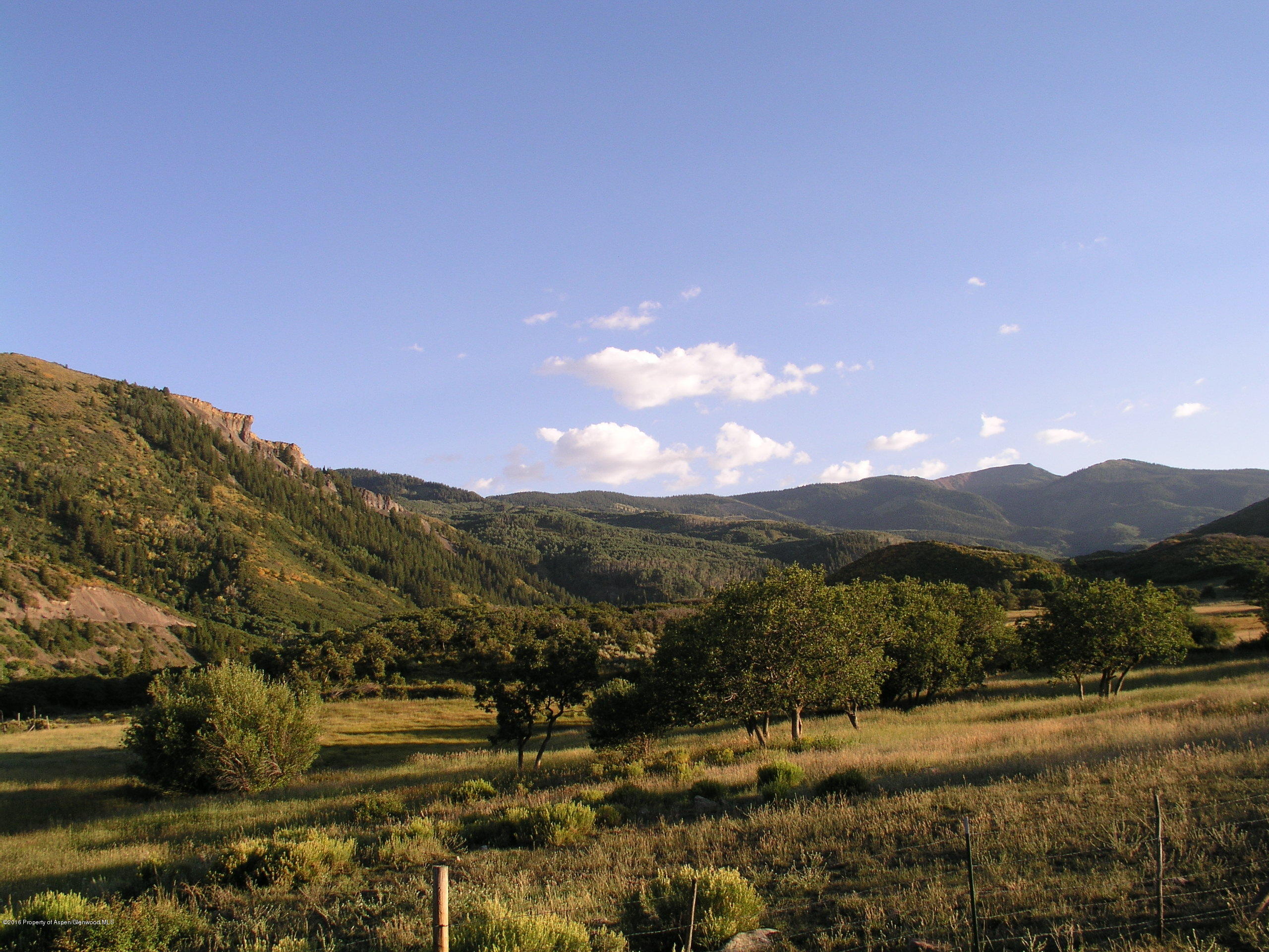 4516 Capitol Creek Road Snowmass, CO 81654 - Photo 47 of 59 a view of a town with mountains in the background
