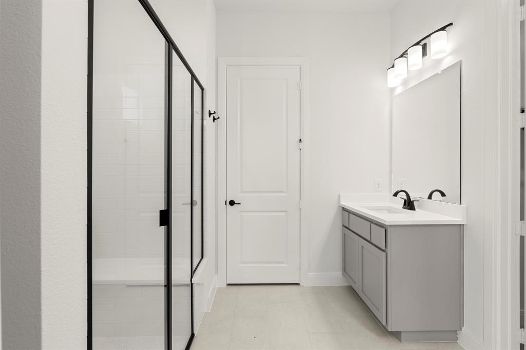 1105 Birdsong Trail Anna, TX 75409 - Photo 20 of 27 a view of a hallway with washer and dryer