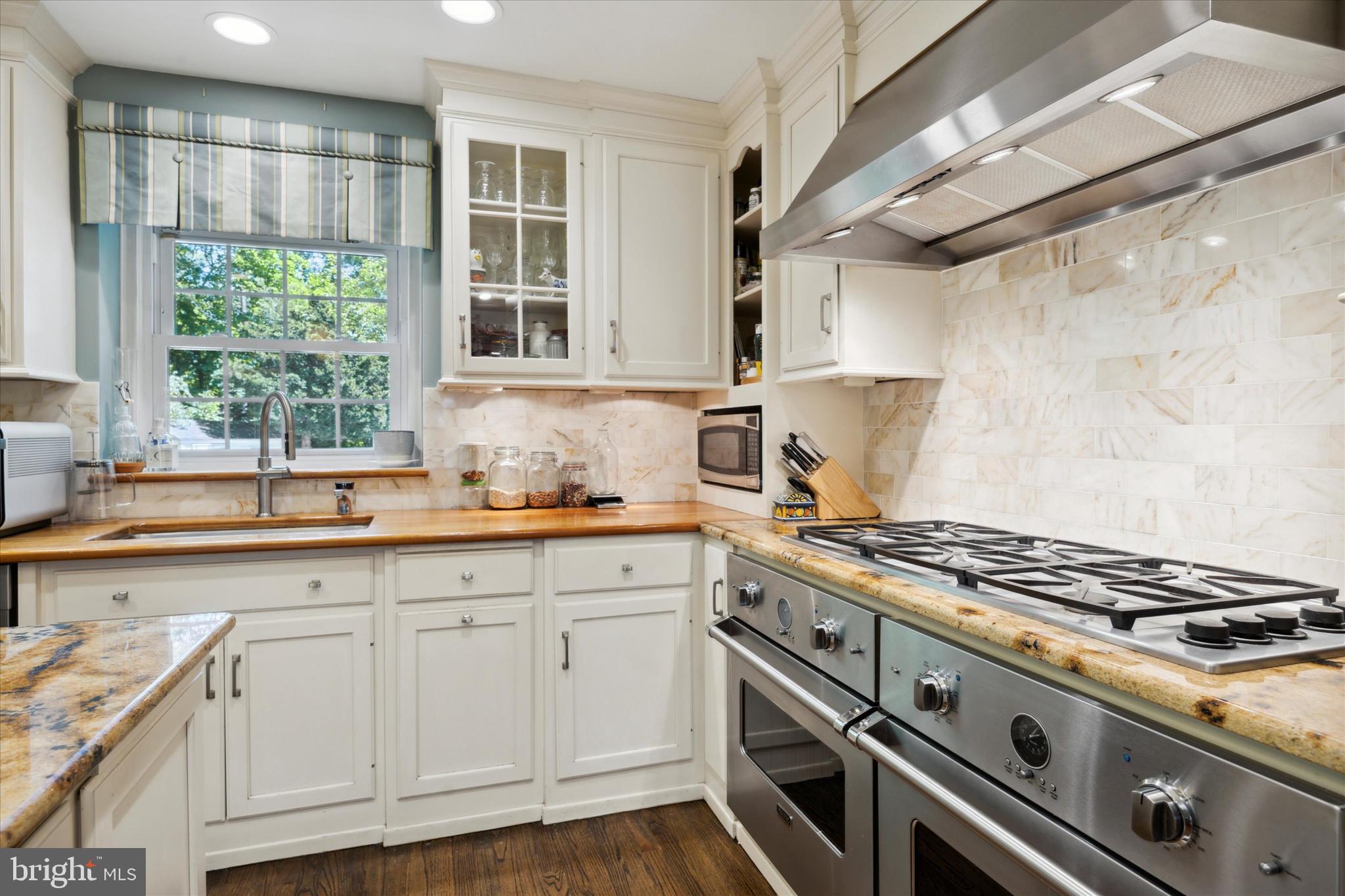 8301 Fairview Road Elkins Park, PA 19027 - Photo 13 of 57 Marble tile backsplash, cherry wood counters