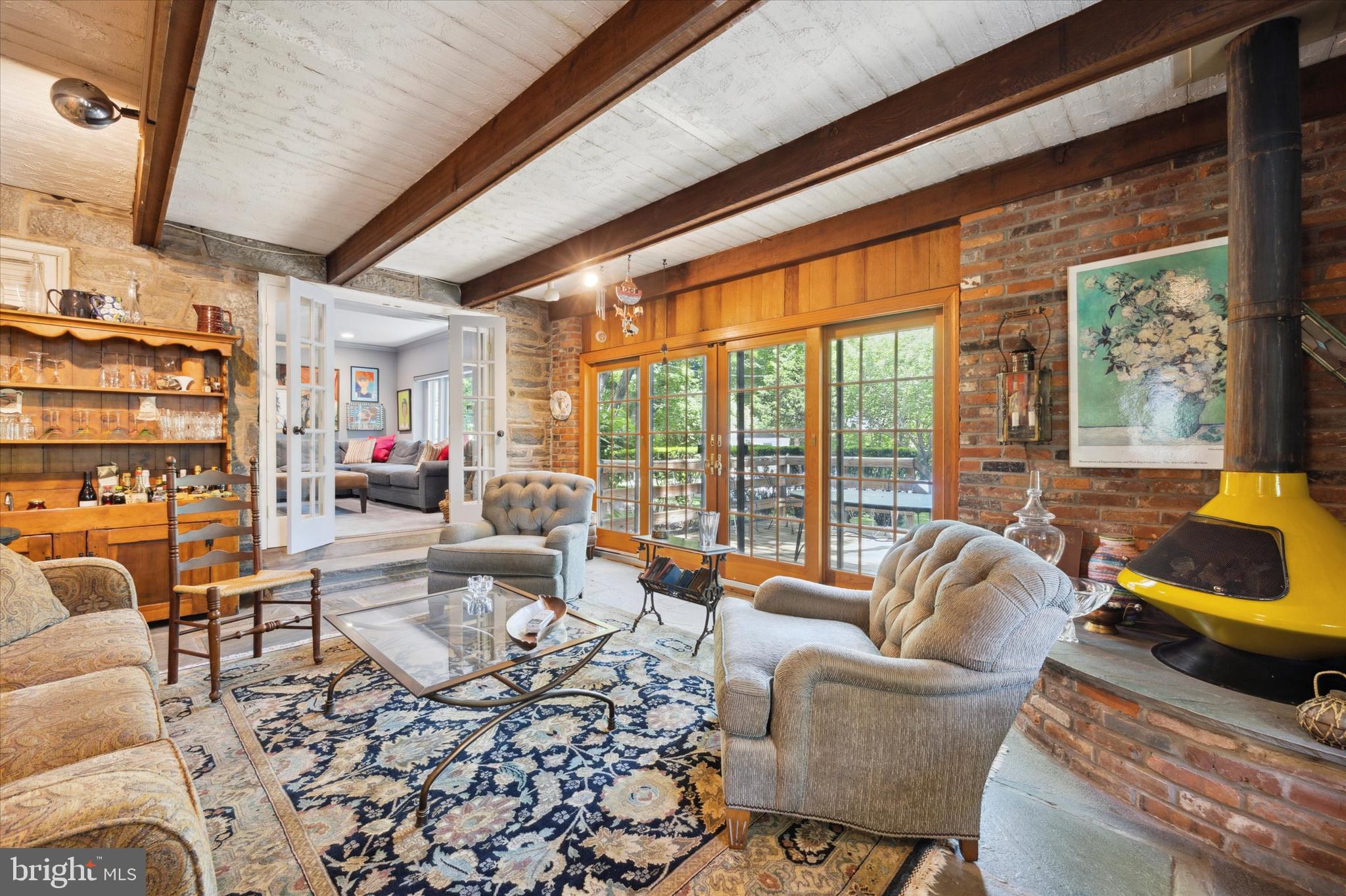 8301 Fairview Road Elkins Park, PA 19027 - Photo 18 of 57 Den has glass-paned sliding doors leading to deck