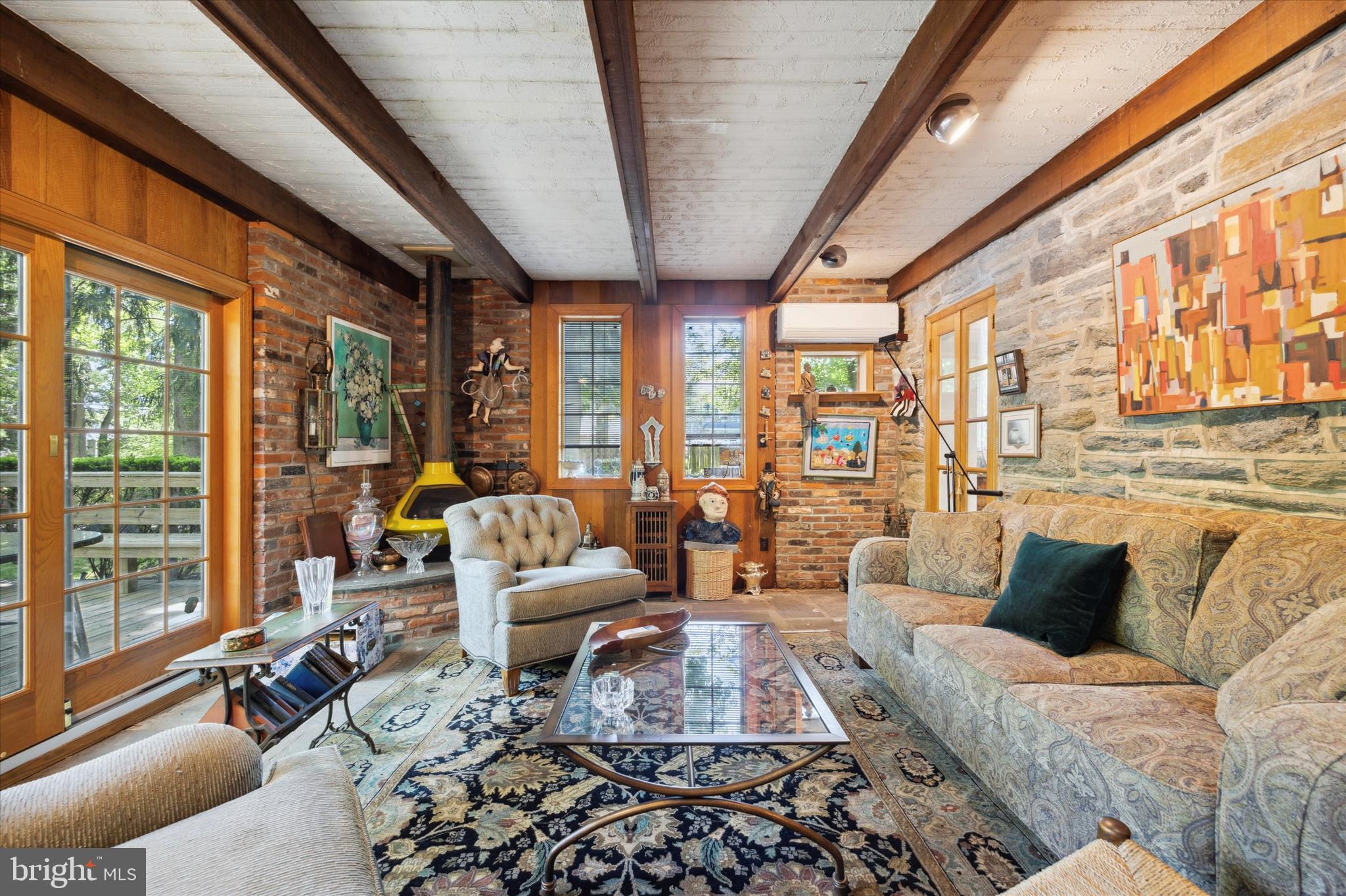 8301 Fairview Road Elkins Park, PA 19027 - Photo 19 of 57 Exposed stone & brick walls, slate flooring