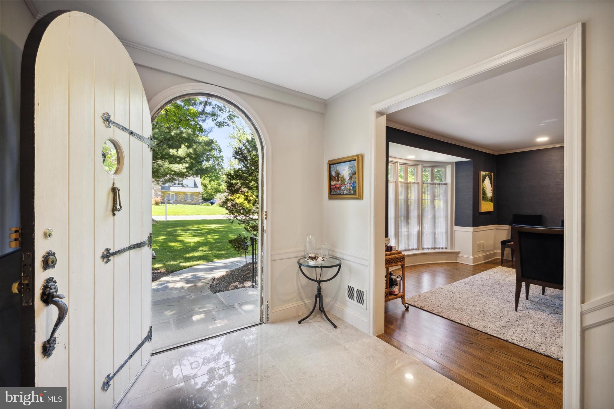 8301 Fairview Road Elkins Park, PA 19027 - Photo 2 of 57 Curved wood door entry into center hall