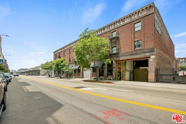 a view of a building with a street