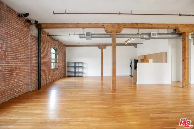 a view of a water heater and an empty space