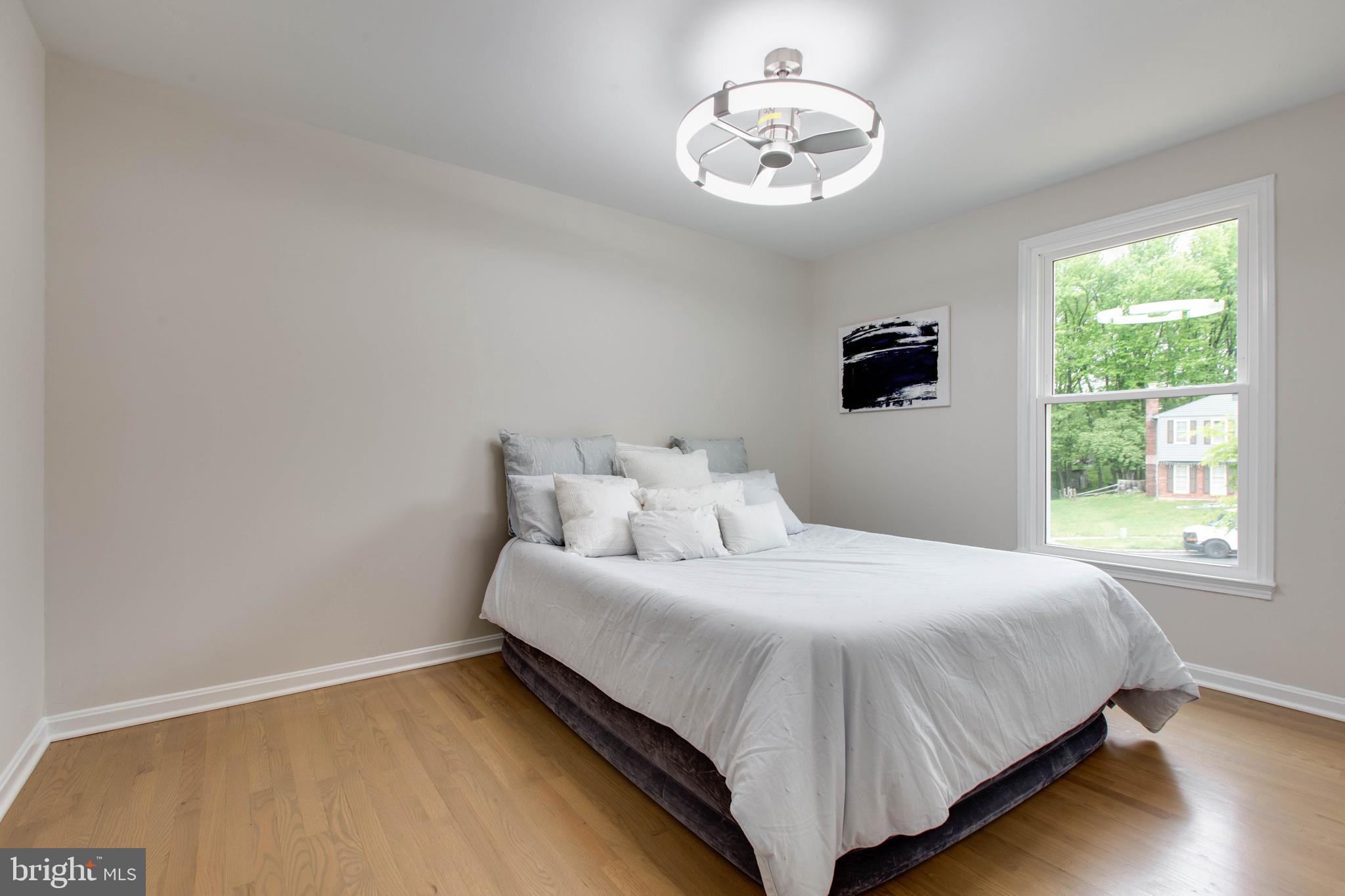 9203 Custer Terrace Adelphi, MD 20783 - Photo 28 of 55 a bedroom with a bed and a window