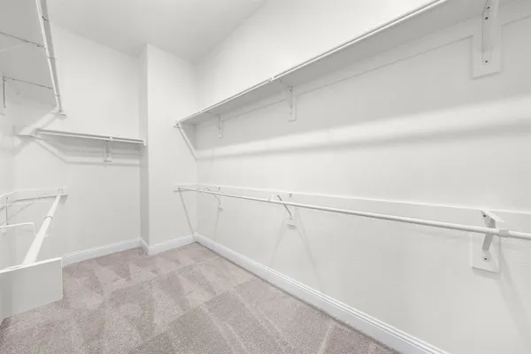 a view of a room with racks on the wall