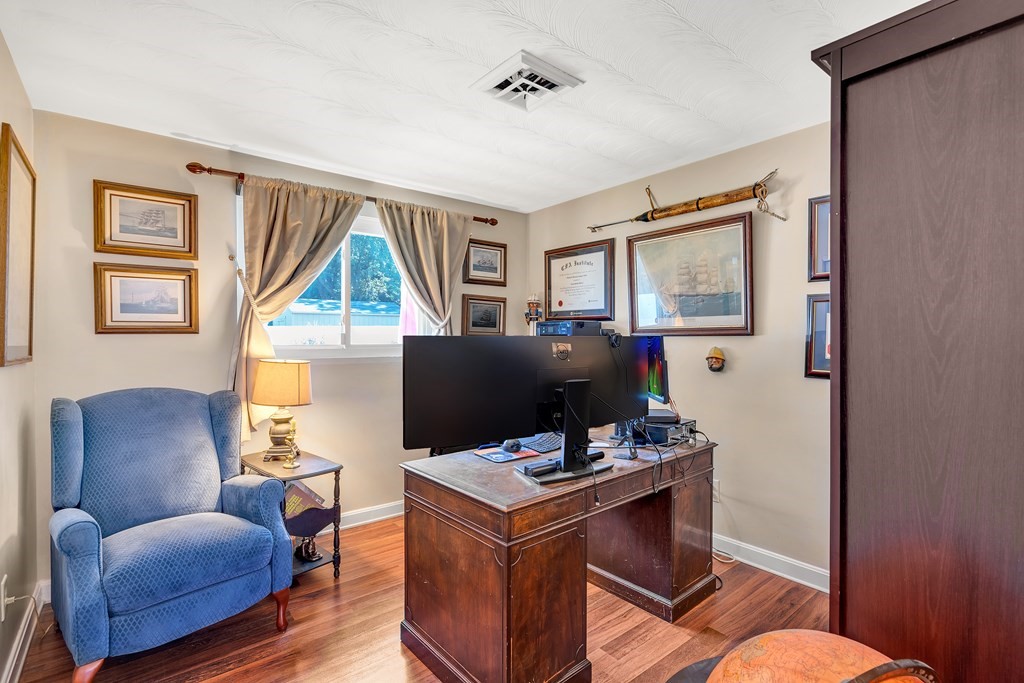 7 Leonard Road Framingham, MA 01701 - Photo 16 of 27 a living room with furniture and a window