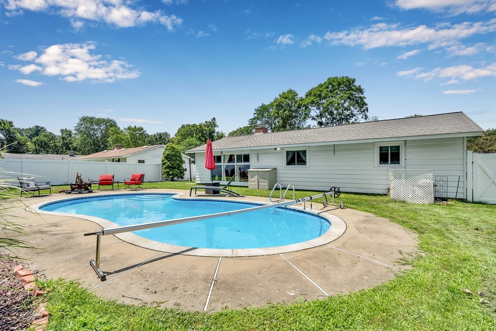 7 Leonard Road Framingham, MA 01701 - Photo 24 of 27 a view of swimming pool with outdoor seating and yard