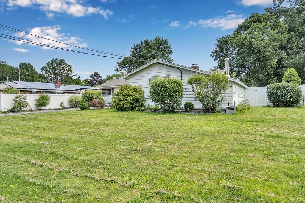 7 Leonard Road Framingham, MA 01701 - Photo 3 of 27 a front view of a house with garden