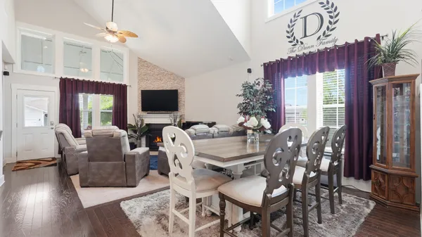 a kitchen with stainless steel appliances kitchen island granite countertop a refrigerator and a stove