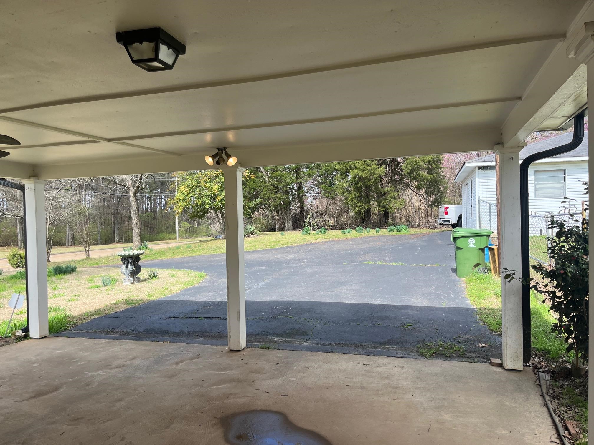 6702 Raleigh Millington Road Millington, TN 38053 - Photo 4 of 20 a view of a porch and garden