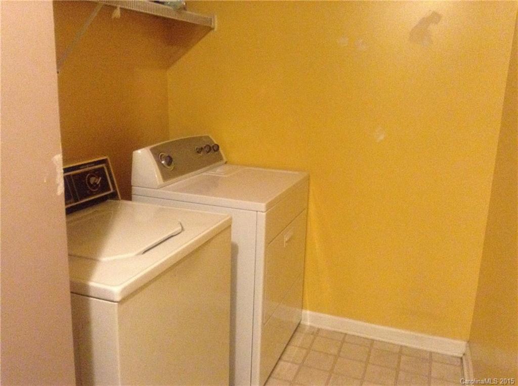 3028 Rockingham Court Southwest Concord, NC 28025 - Photo 14 of 22 a utility room with dryer and washer