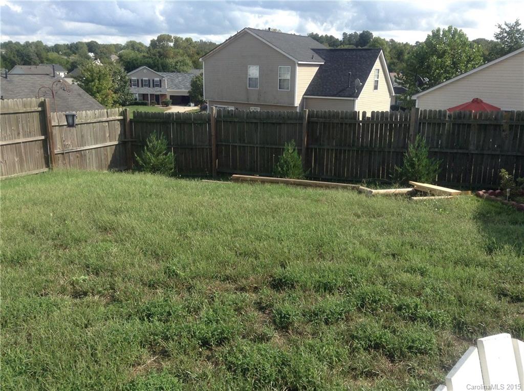 3028 Rockingham Court Southwest Concord, NC 28025 - Photo 22 of 22 a view of a backyard