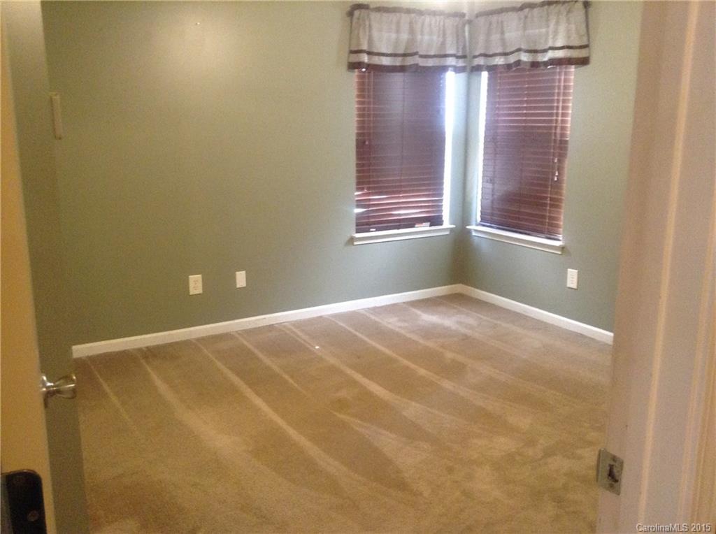 3028 Rockingham Court Southwest Concord, NC 28025 - Photo 8 of 22 a view of a room with window