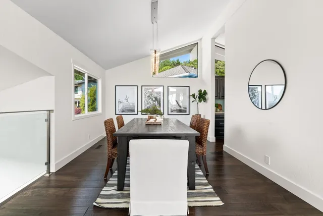 a bedroom with a bed and a lamp