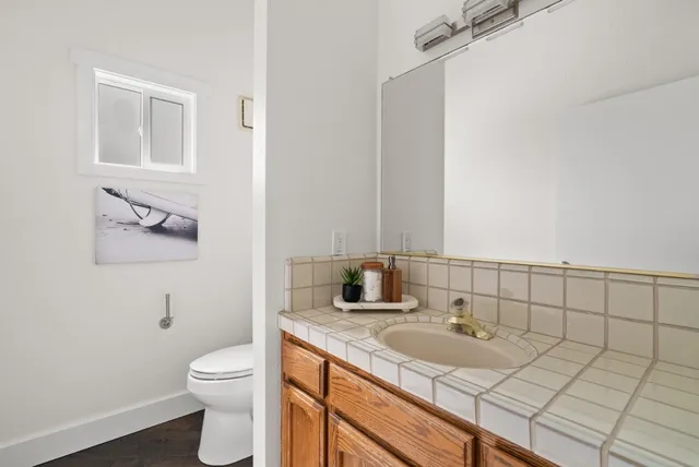 an aerial view of a house with a swimming pool