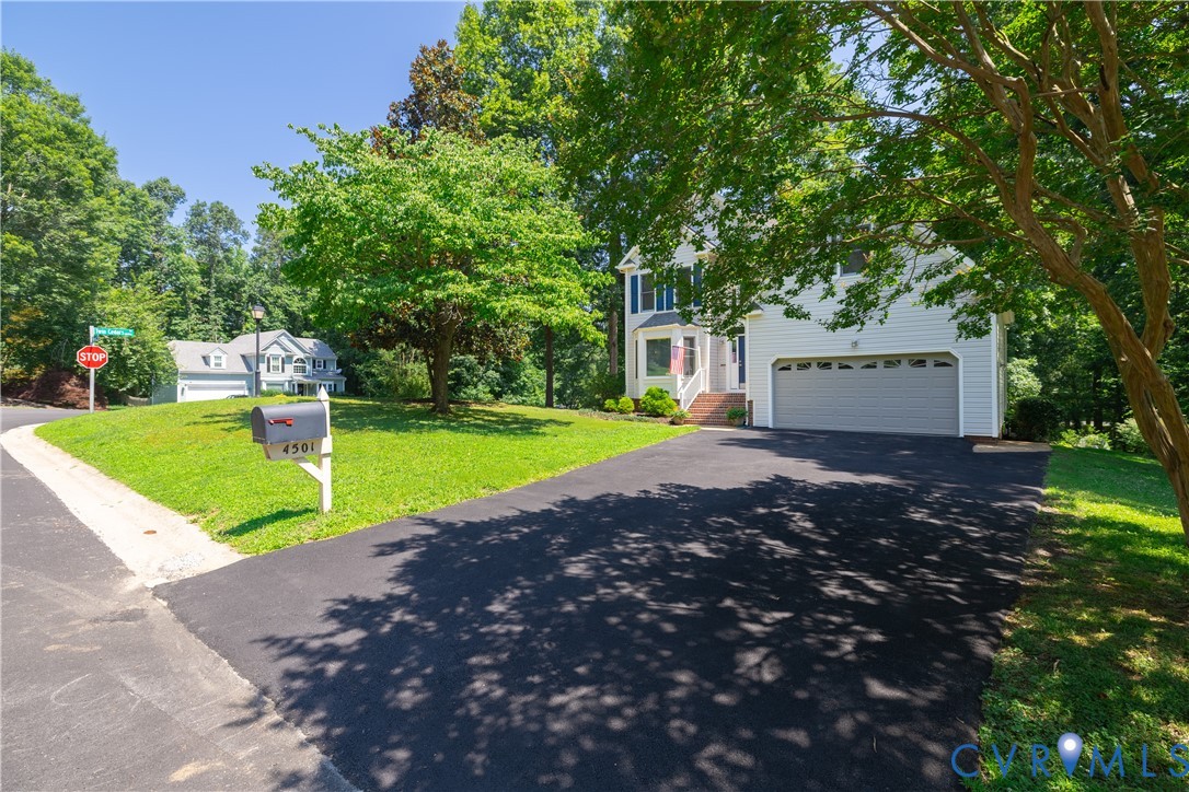 4501 Foxwood Road Chester, VA 23831 - Photo 2 of 42 Traditional two-story home featuring a white sidin