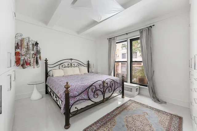 a kitchen with stainless steel appliances granite countertop a stove and a microwave