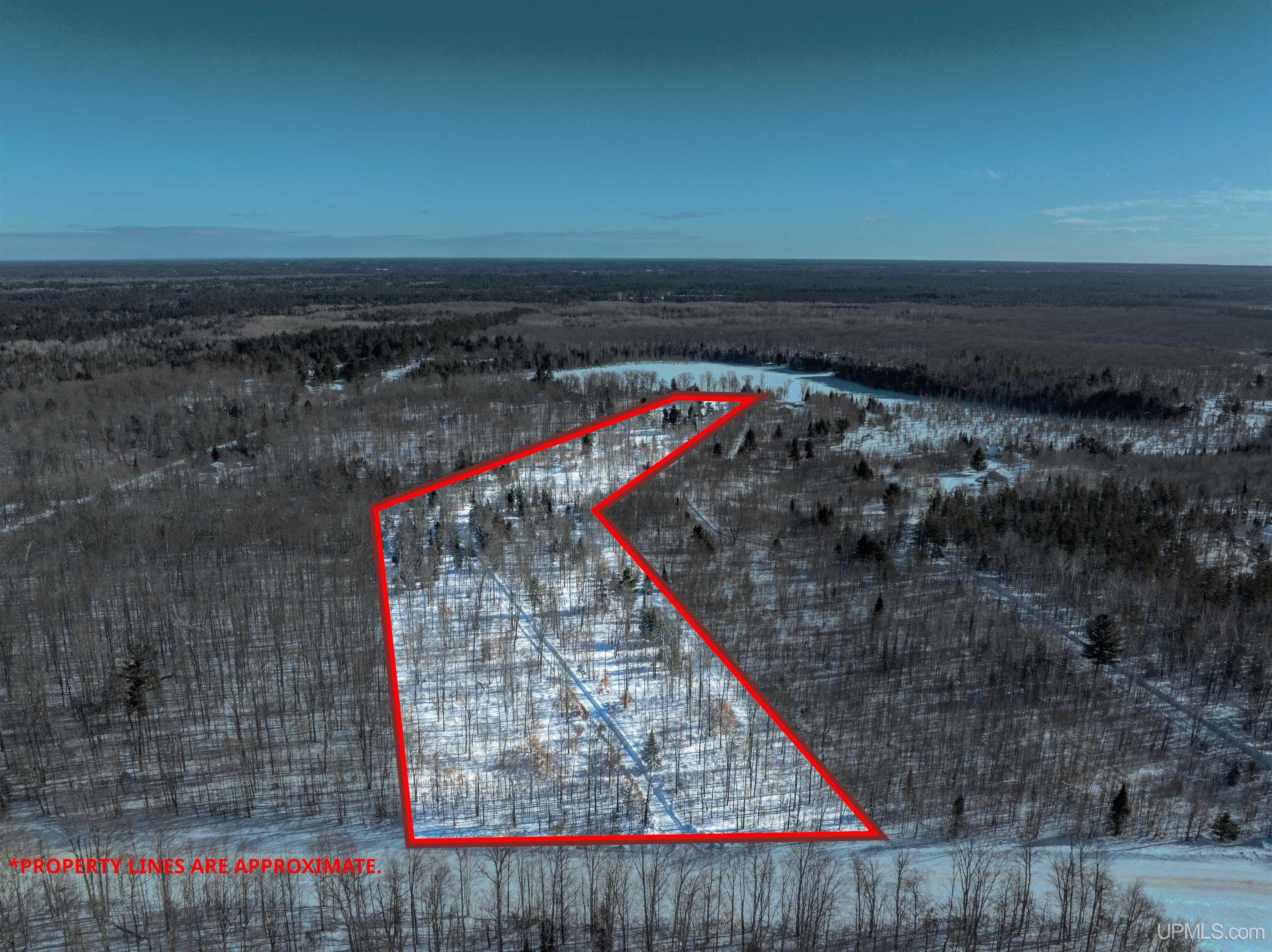 7035 West County 448 Road Manistique, MI 49854 - Photo 1 of 59