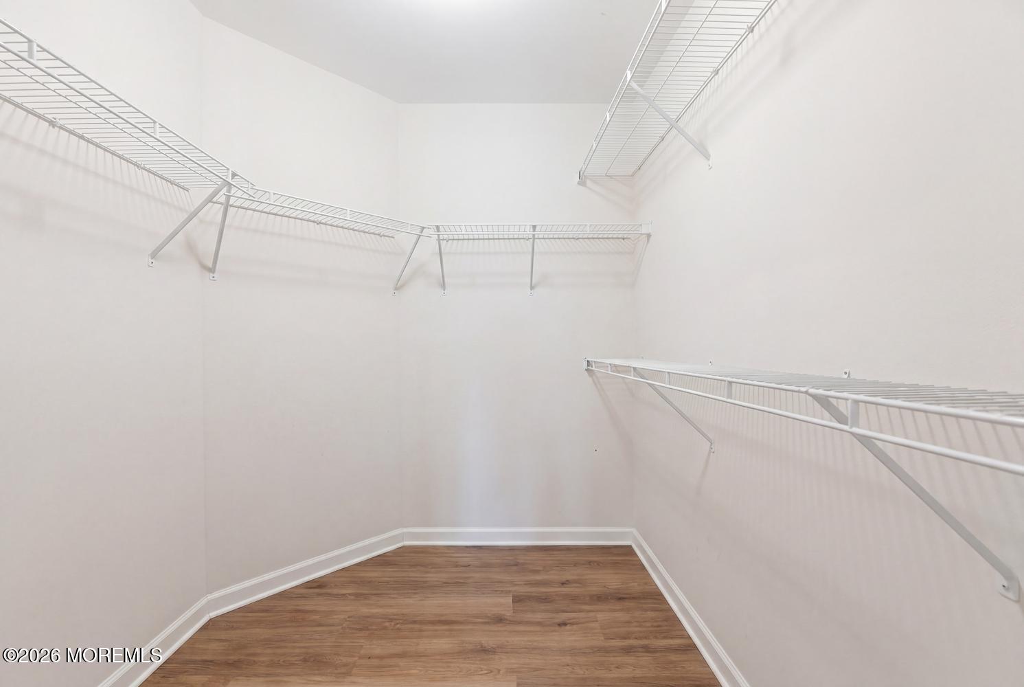7 Cherry Tree Lane Cream Ridge, NJ 08514 - Photo 28 of 47 a view of a room with racks on the wall