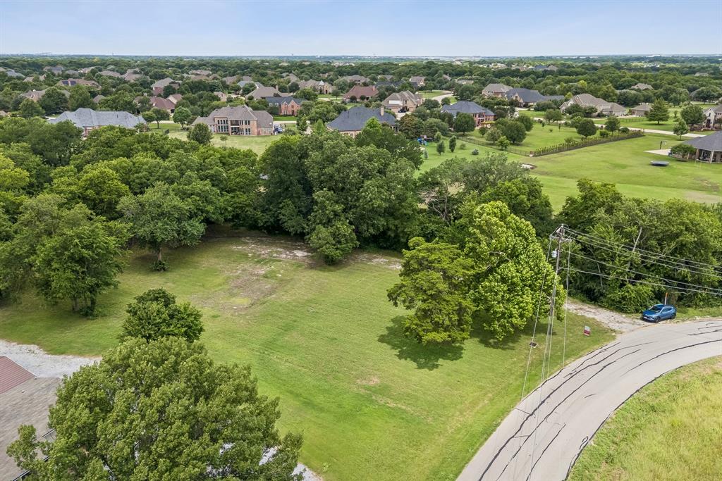 286 West Forest Grove Road Lucas, TX 75002 - Photo 9 of 23 a view of a lake with a yard