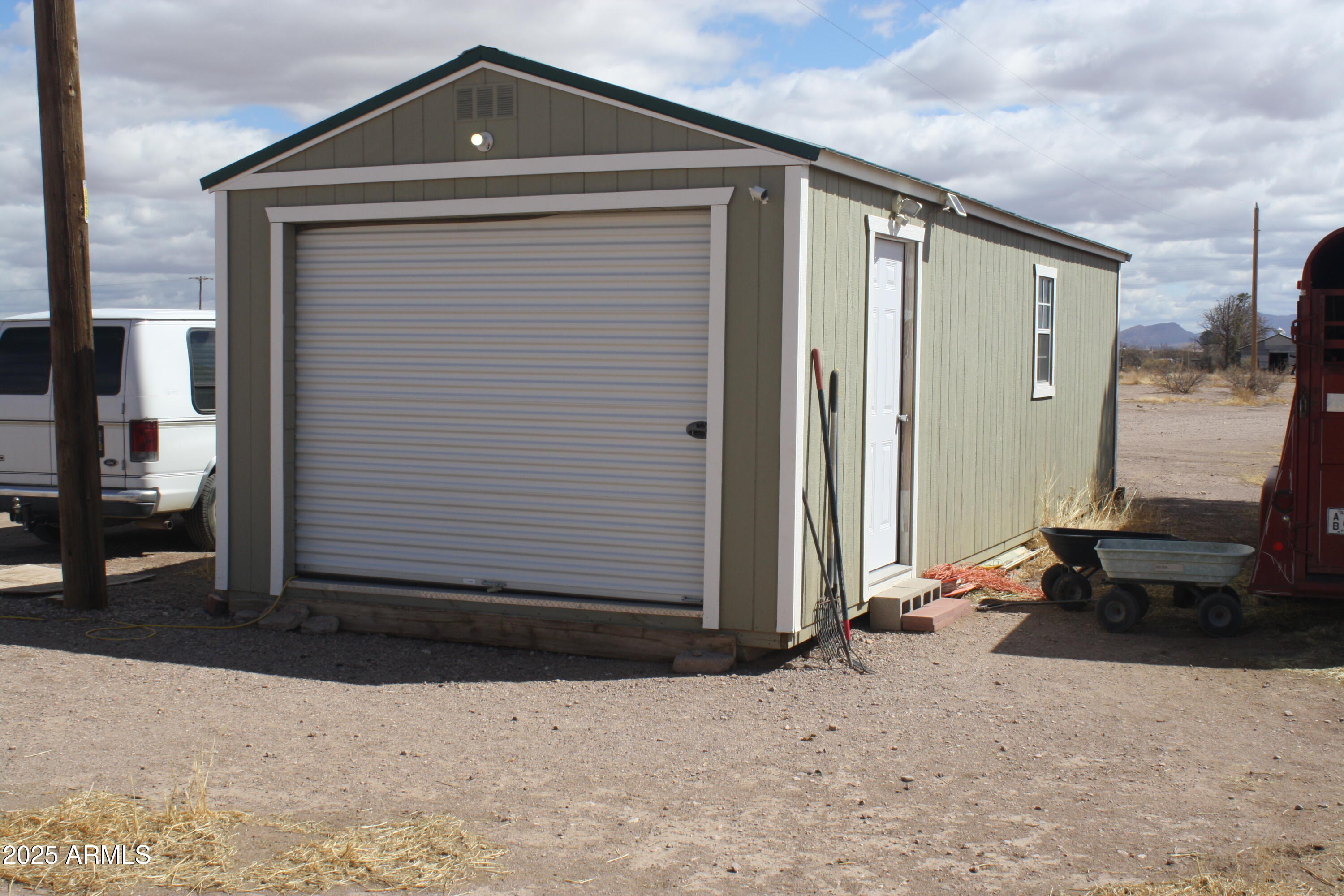 6872 North Brooks Road McNeal, AZ 85617 - Photo 5 of 24 a front view of a house with a yard