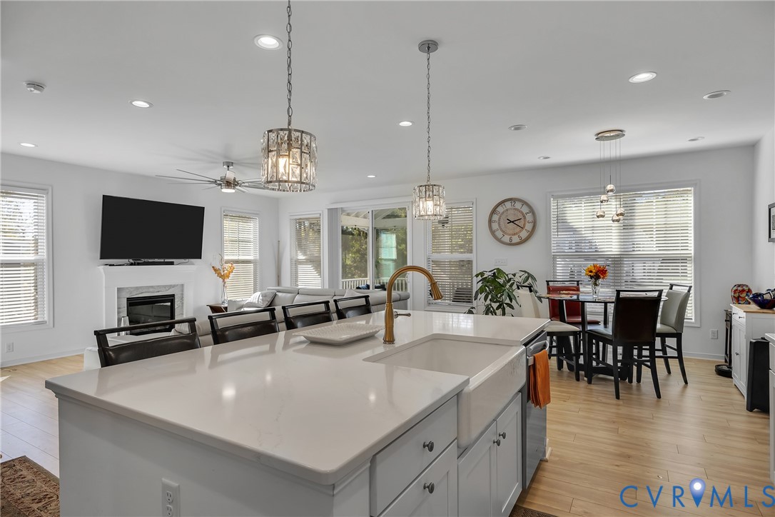 9400 Kinnerton Drive Midlothian, VA 23112 - Photo 11 of 43 a large kitchen with lots of counter space and chandelier