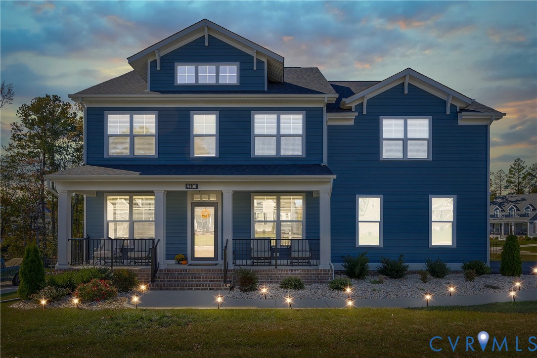 9400 Kinnerton Drive Midlothian, VA 23112 - Photo 2 of 43 a front view of a house with yard and parking