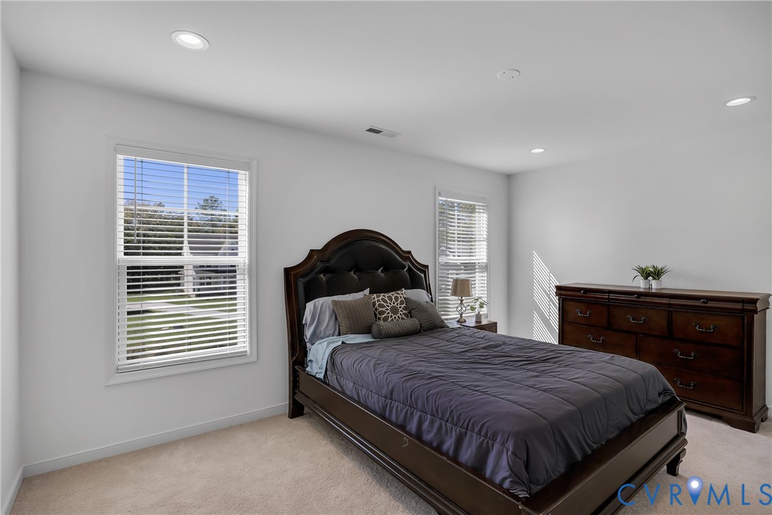 9400 Kinnerton Drive Midlothian, VA 23112 - Photo 21 of 43 a bedroom with a bed and a window