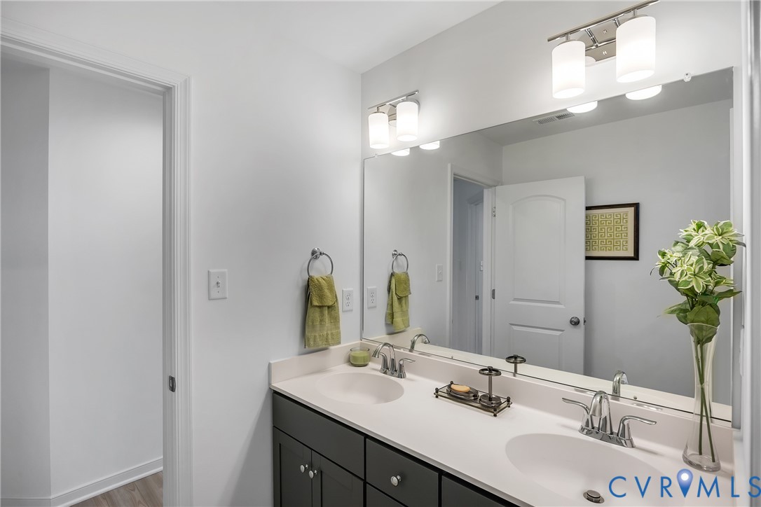 9400 Kinnerton Drive Midlothian, VA 23112 - Photo 22 of 43 a bathroom with a sink double vanity and a mirror