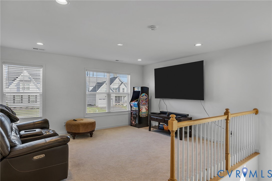 9400 Kinnerton Drive Midlothian, VA 23112 - Photo 26 of 43 a living room with furniture and a flat screen tv