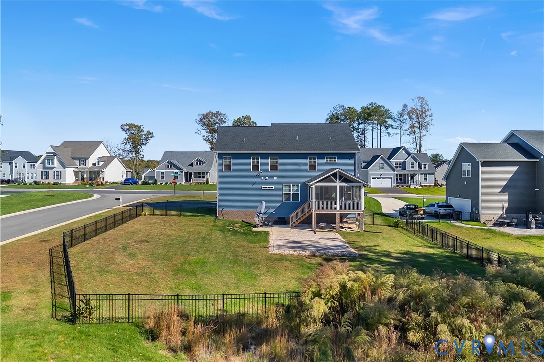 9400 Kinnerton Drive Midlothian, VA 23112 - Photo 38 of 43 a view of a swimming pool with a yard