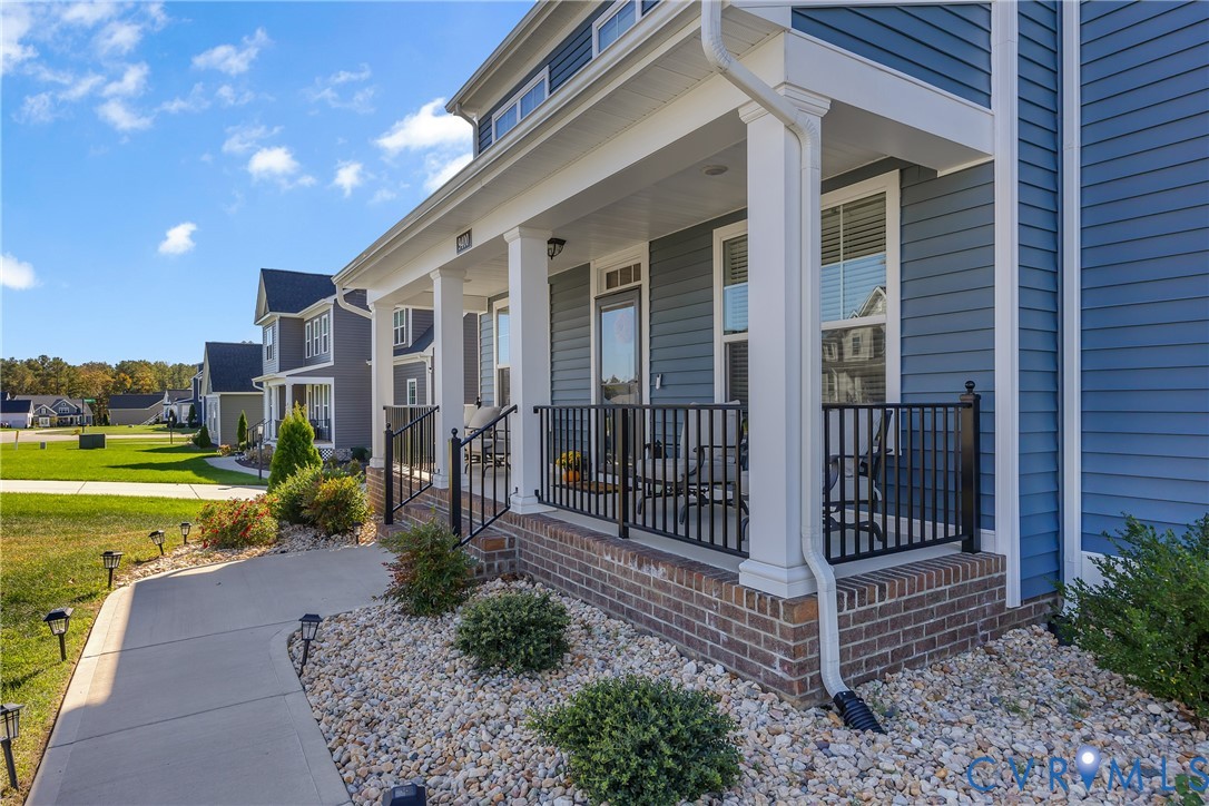 9400 Kinnerton Drive Midlothian, VA 23112 - Photo 4 of 43 a view of a house with a small yard and wooden fence