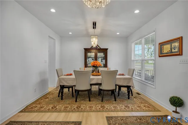 a view of a dining room with furniture