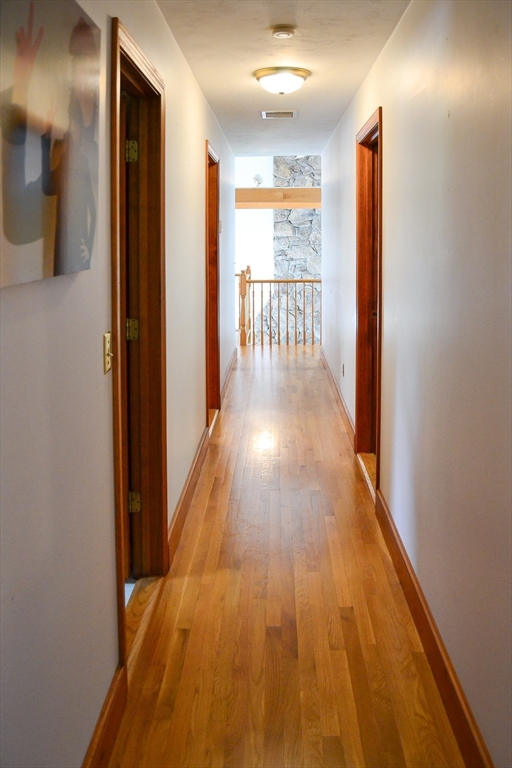 110 Mayflower Ridge Drive Wareham, MA 02571 - Photo 18 of 42 a view of hallway with wooden floor