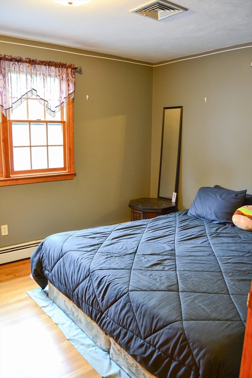 110 Mayflower Ridge Drive Wareham, MA 02571 - Photo 20 of 42 a bedroom with a bed and a window