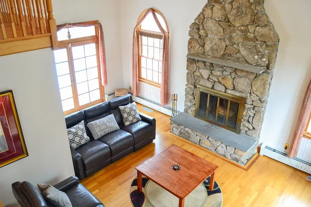 a living room with furniture and a rug