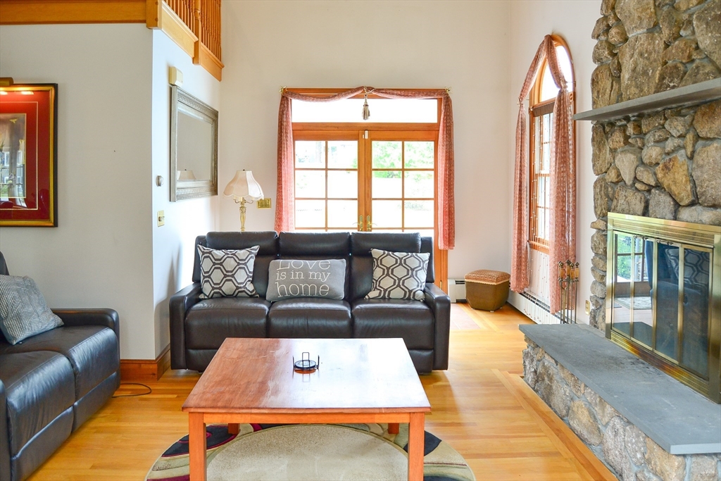 110 Mayflower Ridge Drive Wareham, MA 02571 - Photo 27 of 42 a living room with furniture rug and window