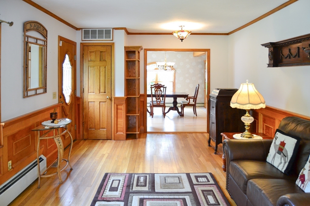 110 Mayflower Ridge Drive Wareham, MA 02571 - Photo 28 of 42 a living room with furniture and a table