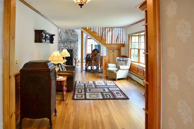 a dining room with furniture and window