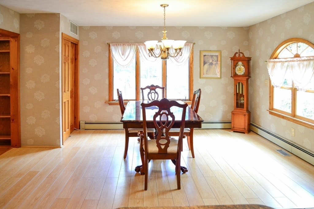 110 Mayflower Ridge Drive Wareham, MA 02571 - Photo 33 of 42 a view of a dining room with furniture window and outside view