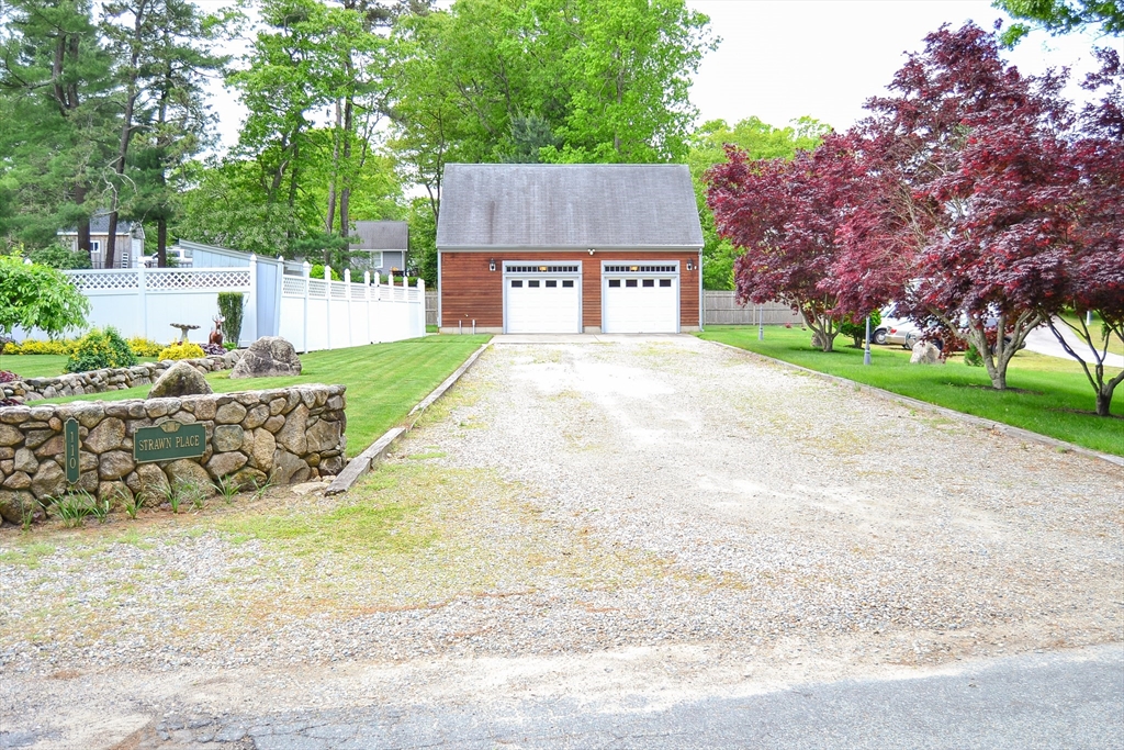 110 Mayflower Ridge Drive Wareham, MA 02571 - Photo 9 of 42 a sign board with parking space