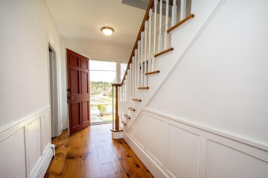 128 Washington Street, Unit F Hanover, MA 02339 - Photo 29 of 42 a view of an entryway with wooden floor